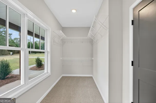 a bathroom with a tub and a shower