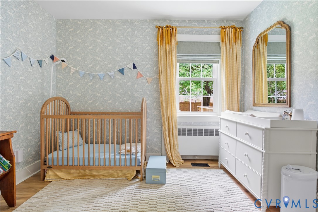 7200 Three Chopt Road Richmond, VA 23226 - Photo 27 of 48 Room featuring patterned wallpaper, wood-finish fl