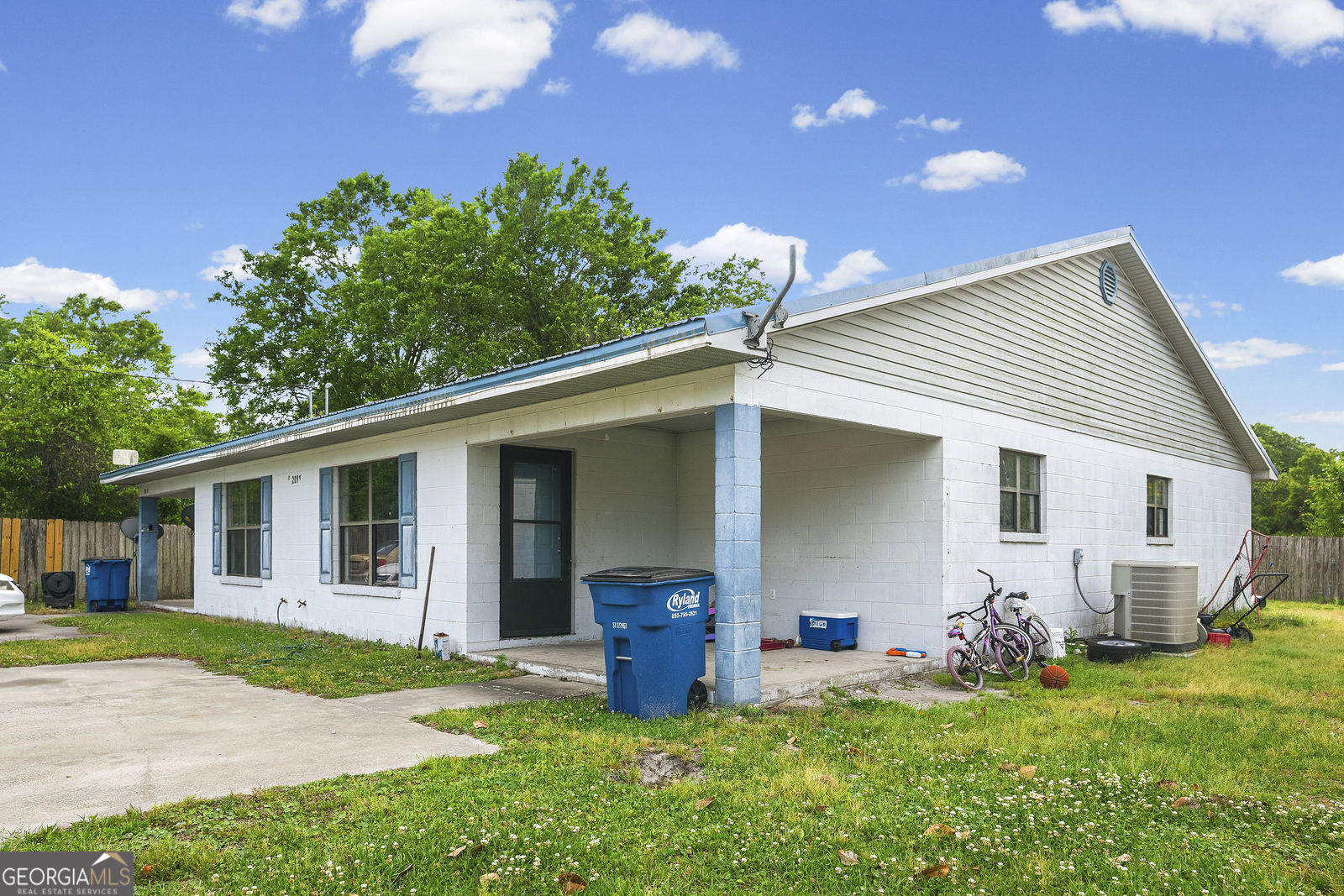 304 Cannon Street Nahunta, GA 31553 - Photo 12 of 51 a view of a house with backyard and porch