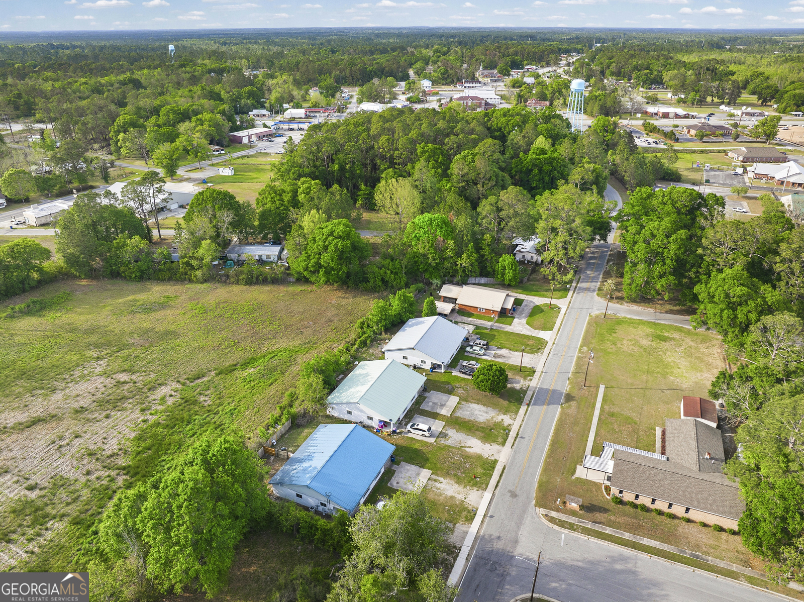 304 Cannon Street Nahunta, GA 31553 - Photo 18 of 51 an aerial view of residential houses with outdoor space and river