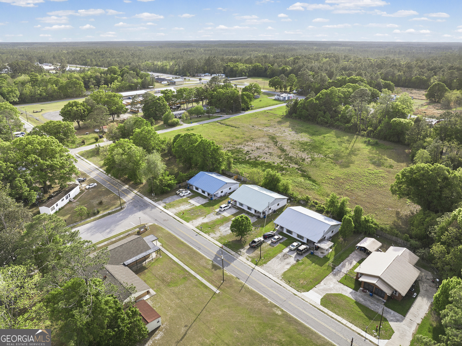 304 Cannon Street Nahunta, GA 31553 - Photo 20 of 51 an aerial view of residential houses with outdoor space