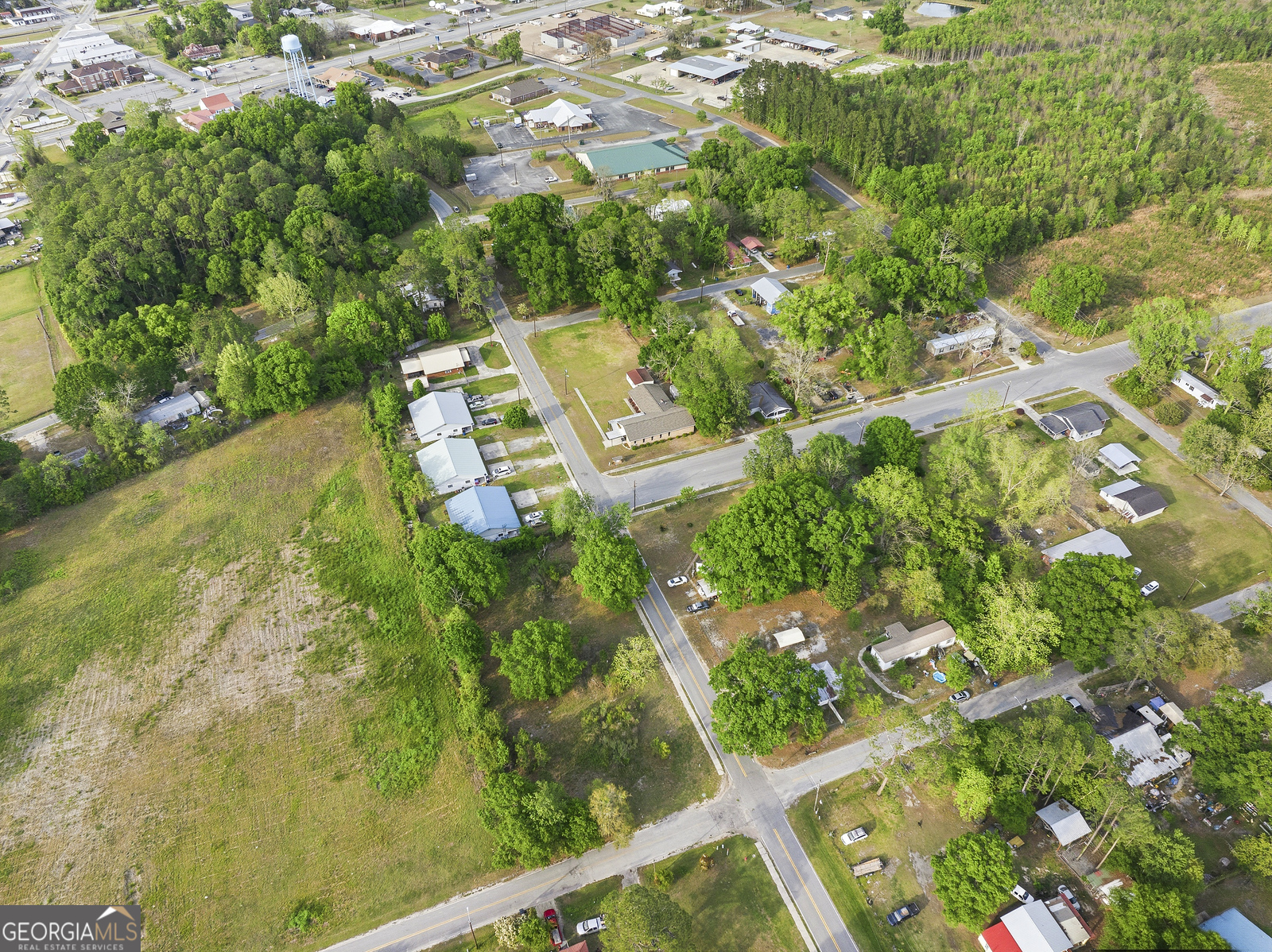 304 Cannon Street Nahunta, GA 31553 - Photo 24 of 51 an aerial view of residential house with outdoor space and trees all around