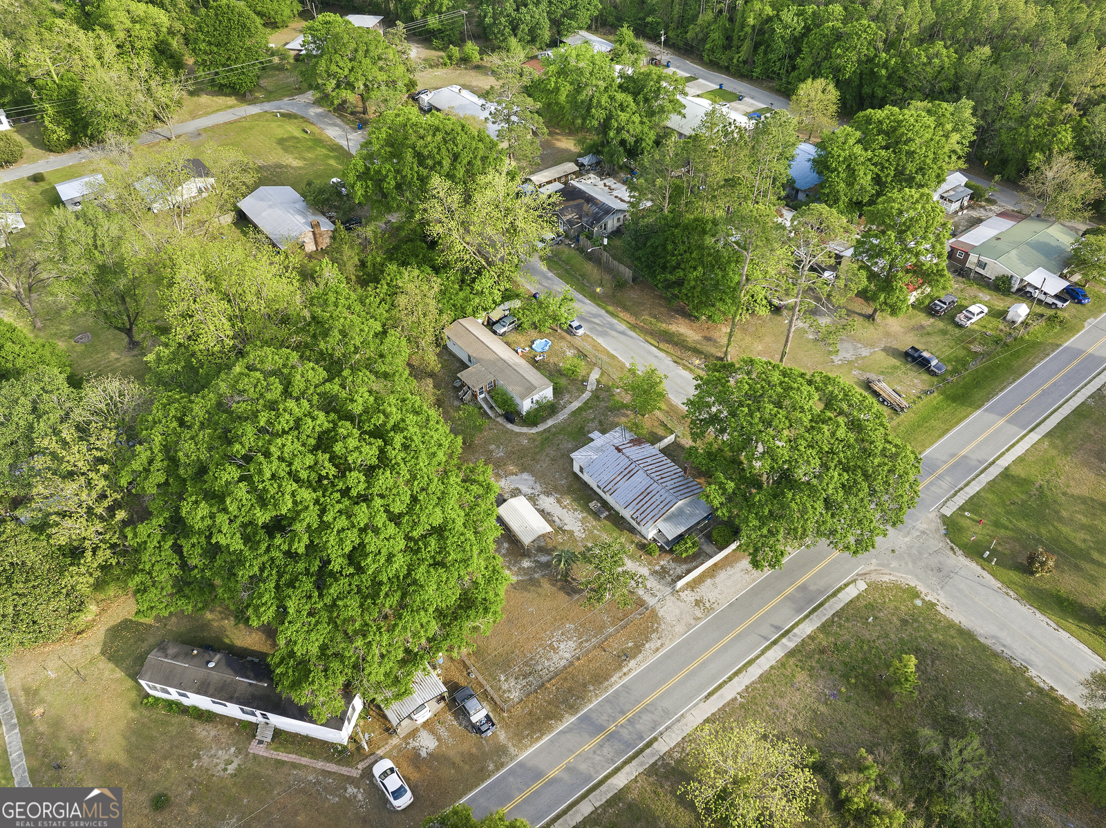 304 Cannon Street Nahunta, GA 31553 - Photo 29 of 51 an aerial view of residential house with outdoor space and trees all around