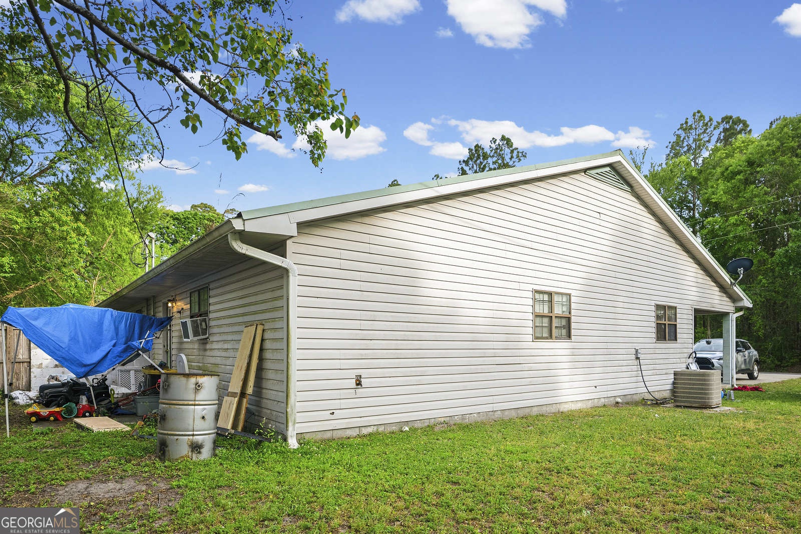 304 Cannon Street Nahunta, GA 31553 - Photo 32 of 51 a view of a house with a yard