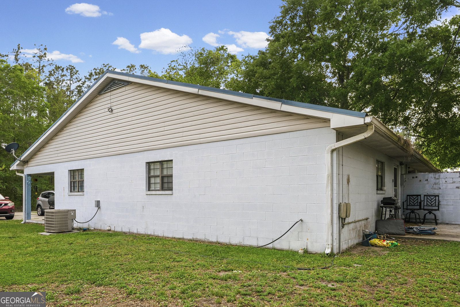304 Cannon Street Nahunta, GA 31553 - Photo 33 of 51 a view of a backyard with a garden