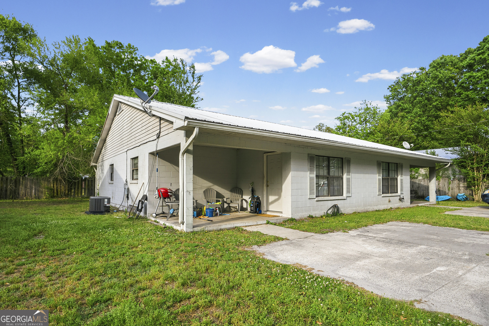 304 Cannon Street Nahunta, GA 31553 - Photo 40 of 51 a view of a house with yard and tree s