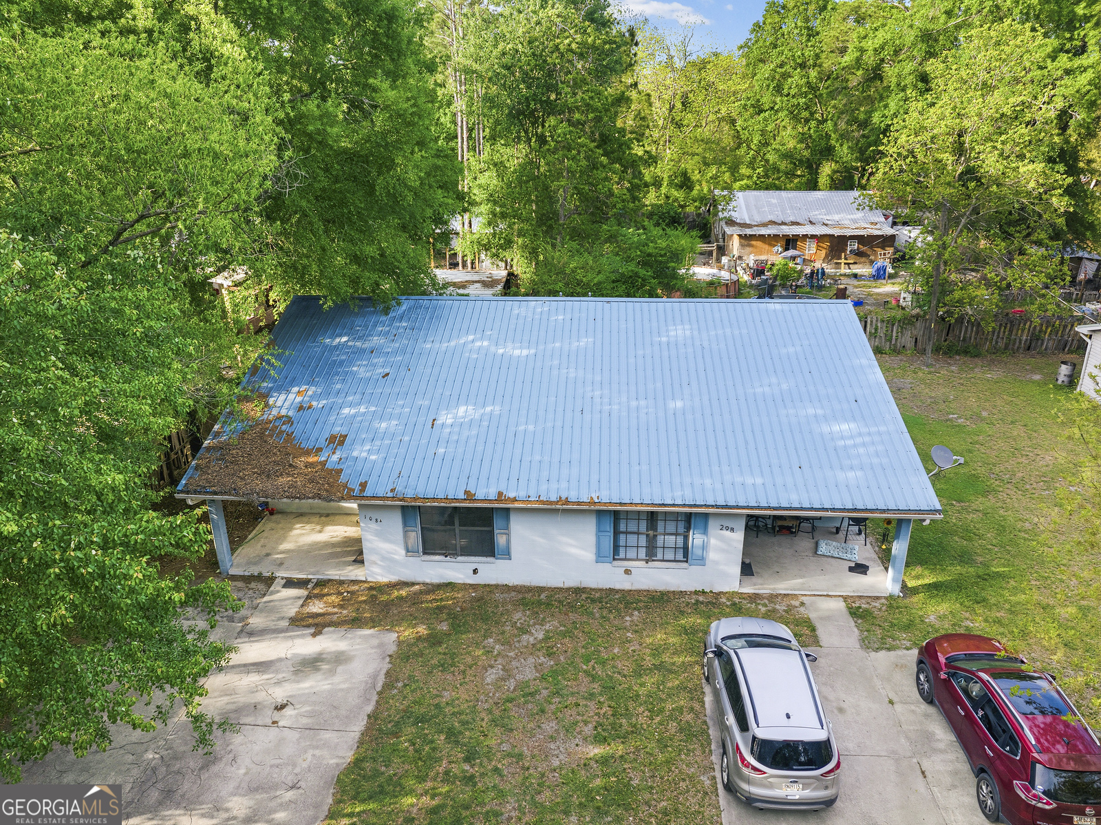 304 Cannon Street Nahunta, GA 31553 - Photo 44 of 51 an aerial view of a house with swimming pool garden and patio