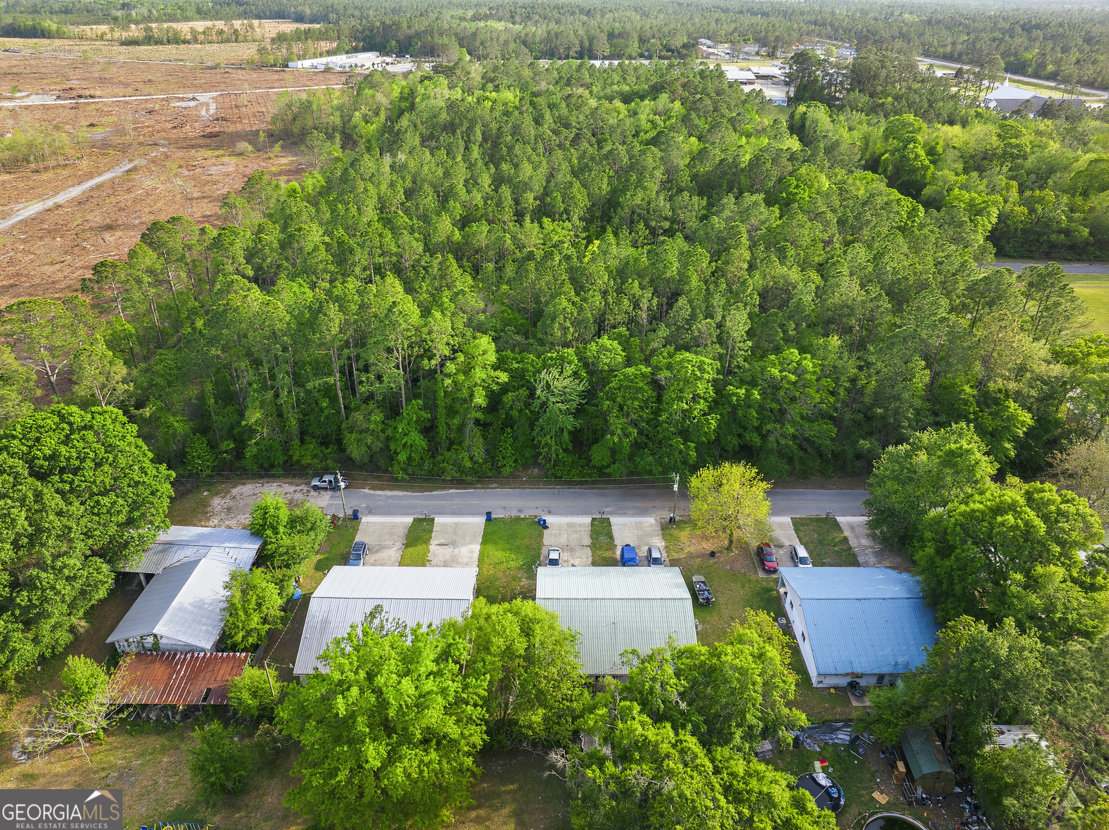 304 Cannon Street Nahunta, GA 31553 - Photo 46 of 51 an aerial view of a house with swimming pool garden and patio