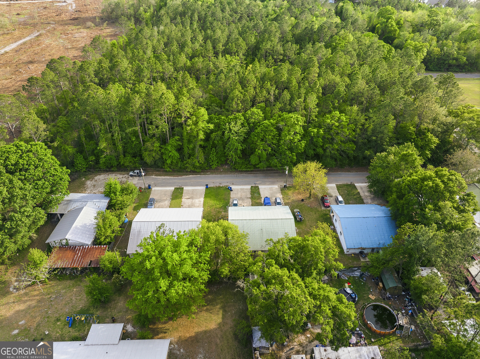 304 Cannon Street Nahunta, GA 31553 - Photo 47 of 51 an aerial view of a house with yard and outdoor seating