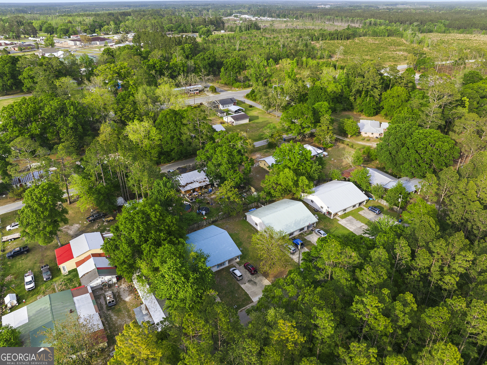 304 Cannon Street Nahunta, GA 31553 - Photo 50 of 51 an aerial view of residential houses with outdoor space and trees