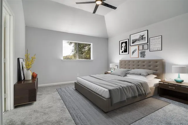 a bedroom with a bed and a couch