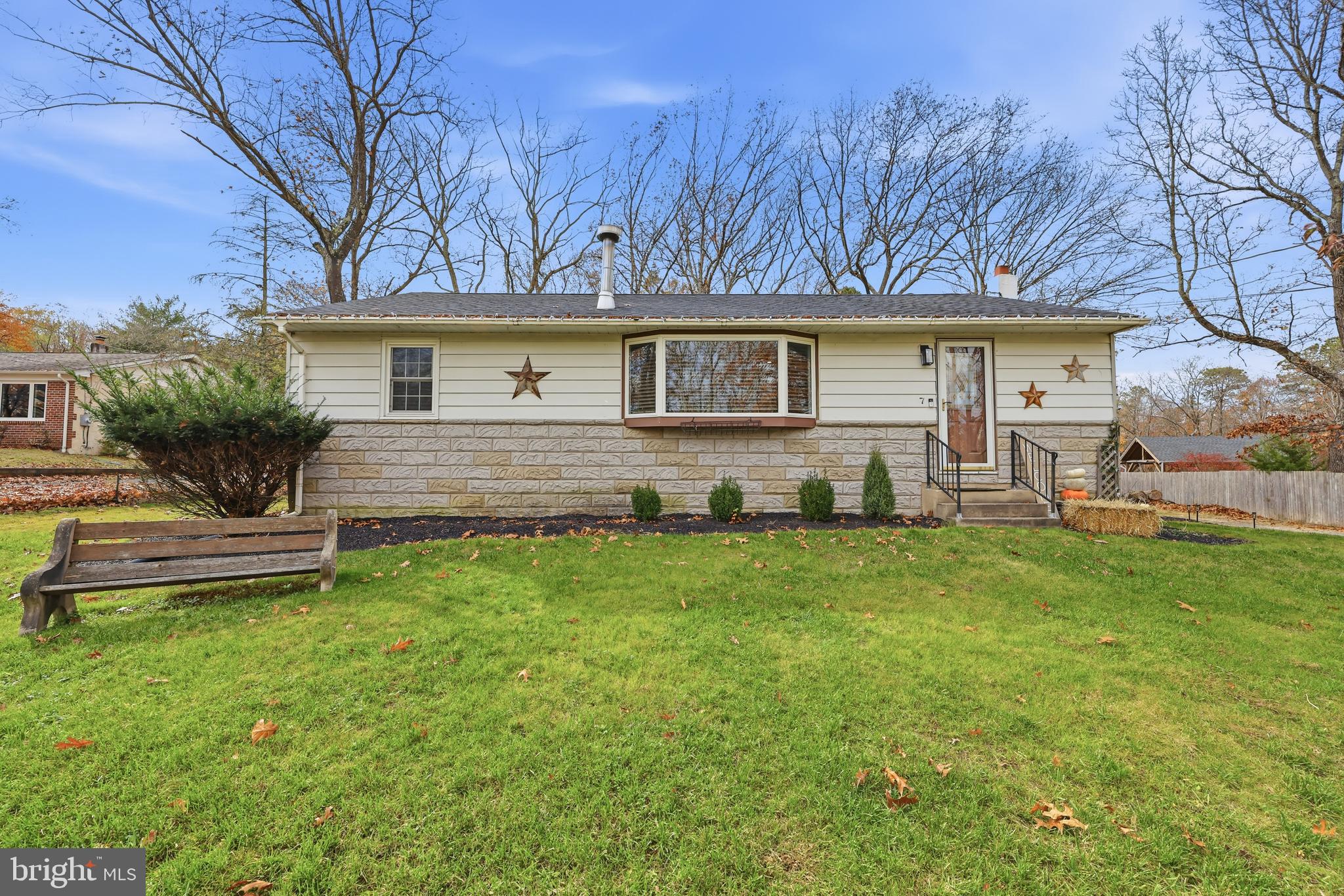 7 Anne Drive Tabernacle, NJ 08088 - Photo 1 of 44 a front view of a house with a garden and yard