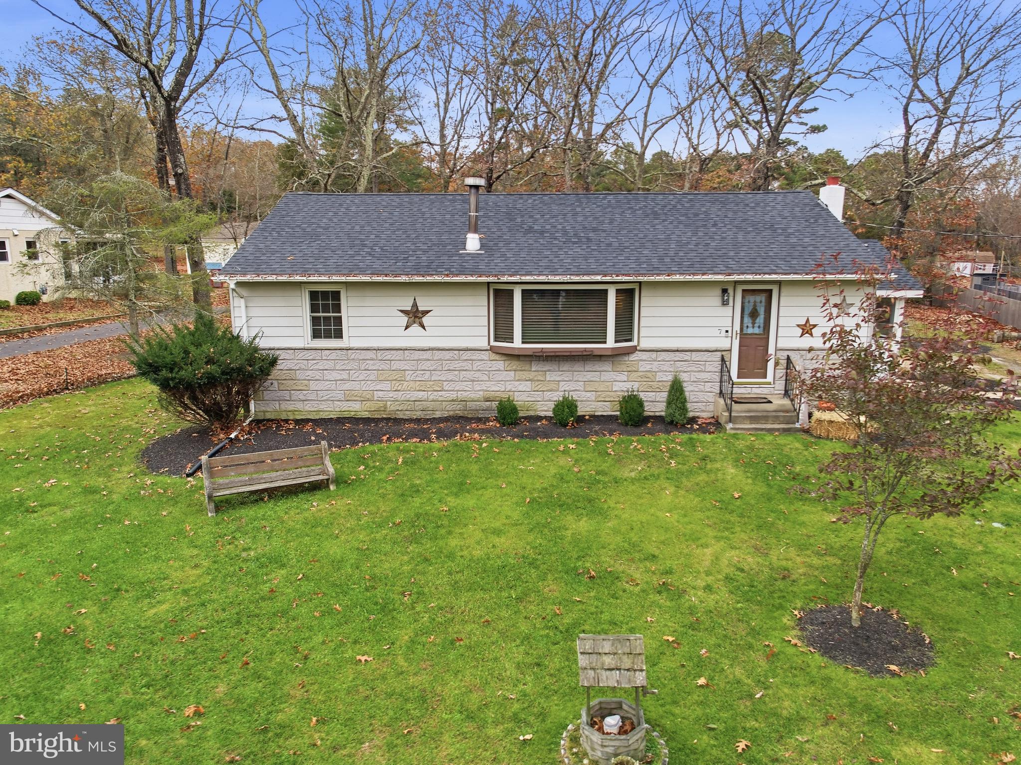 7 Anne Drive Tabernacle, NJ 08088 - Photo 5 of 44 a front view of a house with a garden