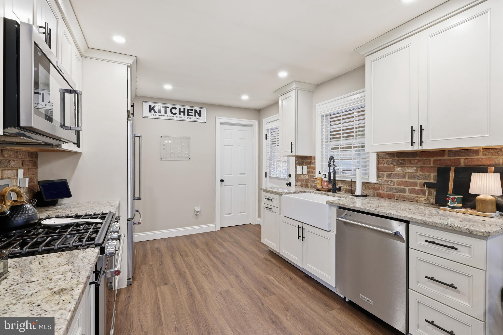 7 Anne Drive Tabernacle, NJ 08088 - Photo 6 of 44 a kitchen with white cabinets and appliances