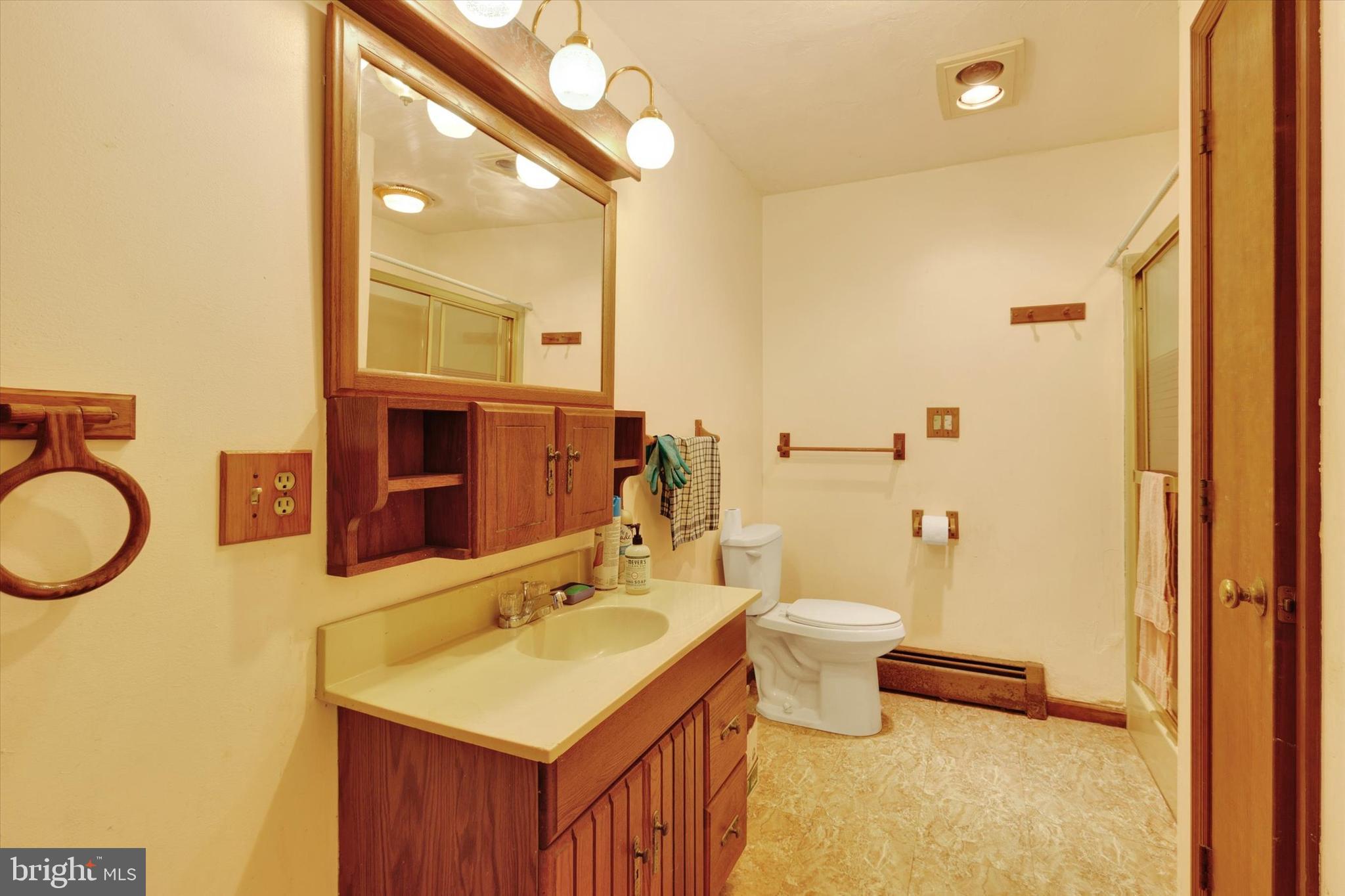 523 River Road Delta, PA 17314 - Photo 20 of 27 a bathroom with a sink vanity granite and toilet