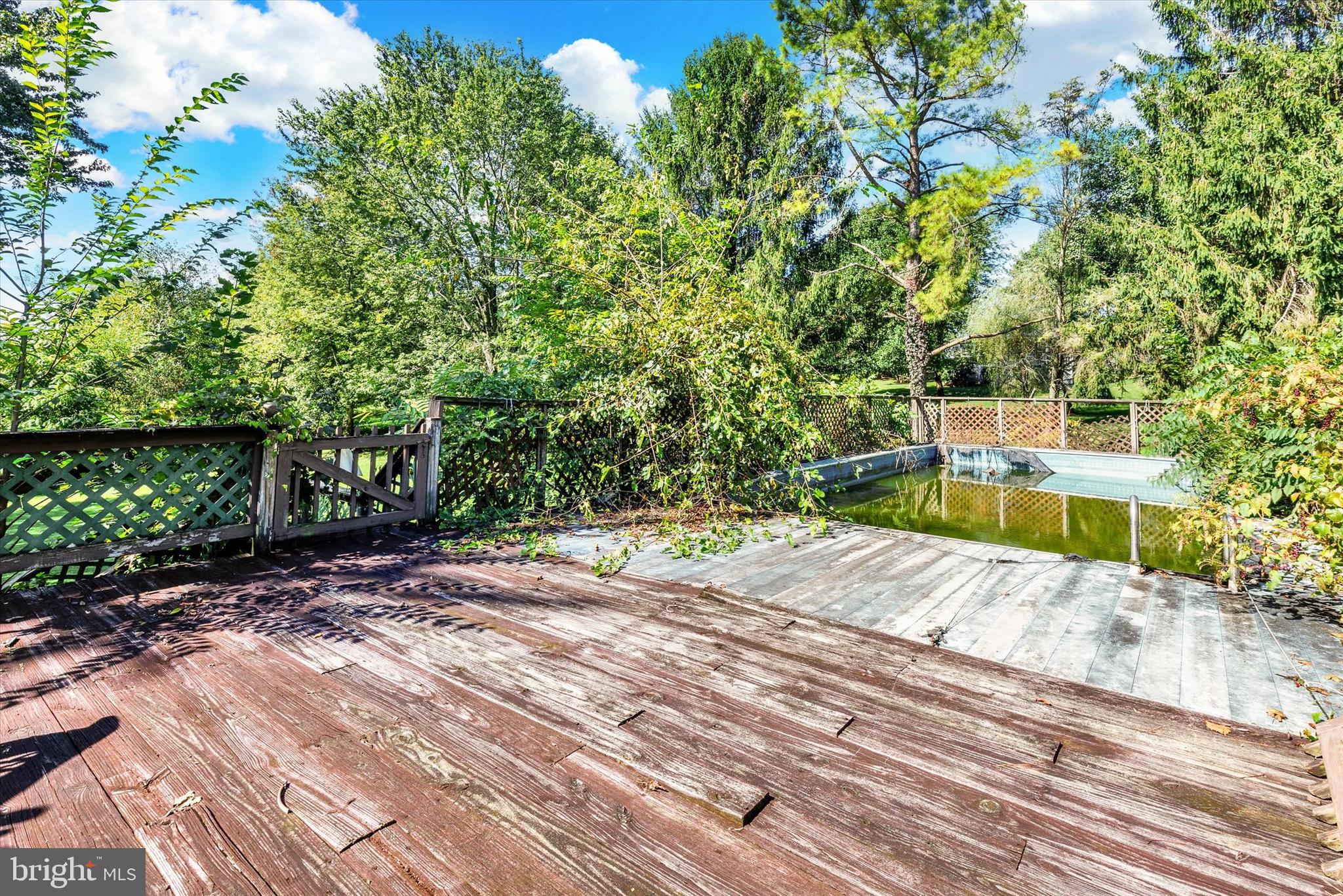 523 River Road Delta, PA 17314 - Photo 23 of 27 a wooden bench sitting on top of a wooden floor
