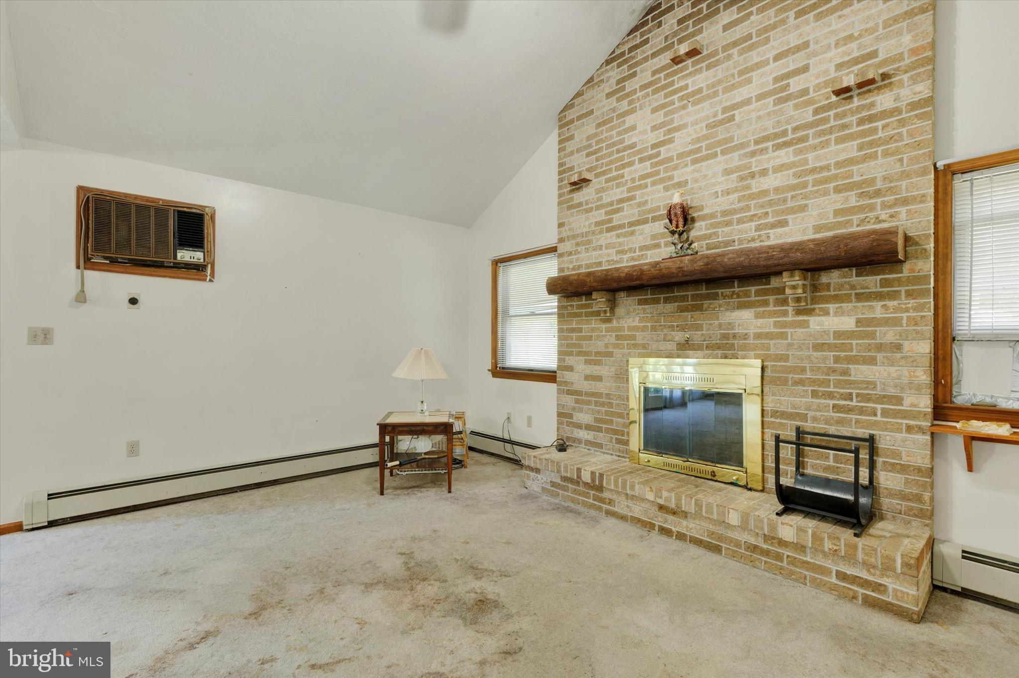 523 River Road Delta, PA 17314 - Photo 6 of 27 a living room with furniture and a fireplace