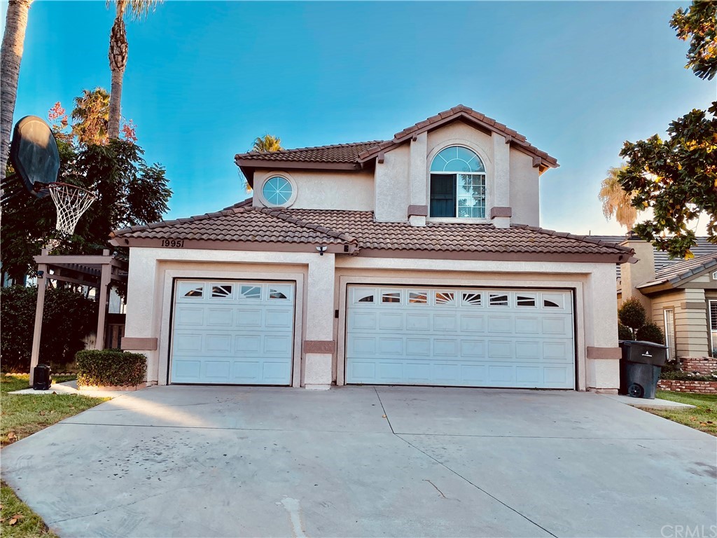 19951 Westerly Drive Riverside, CA 92508 - Photo 1 of 1 a view of a house with a yard and garage