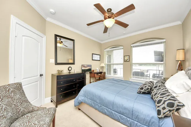 a kitchen with lots of counter top space a sink appliances and cabinets
