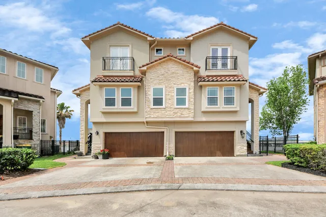 an aerial view of a house with a garden