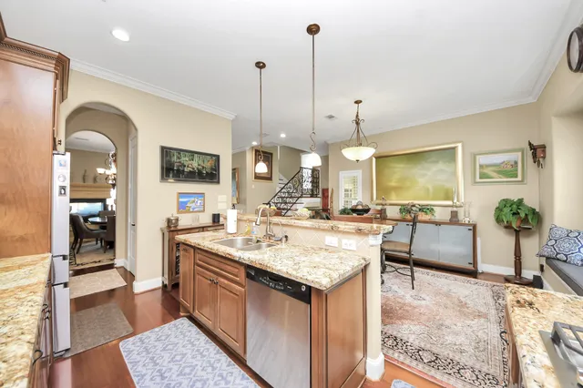 a view of a balcony with wooden floor and lake view