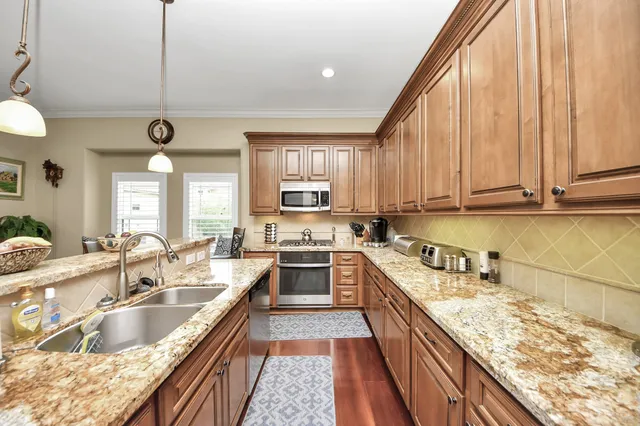 a spacious bathroom with a double vanity sink double and a mirror