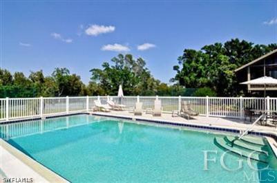 978 Sand Castle Road Sanibel, FL 33957 - Photo 8 of 10 a view of a house with a yard deck and sitting area