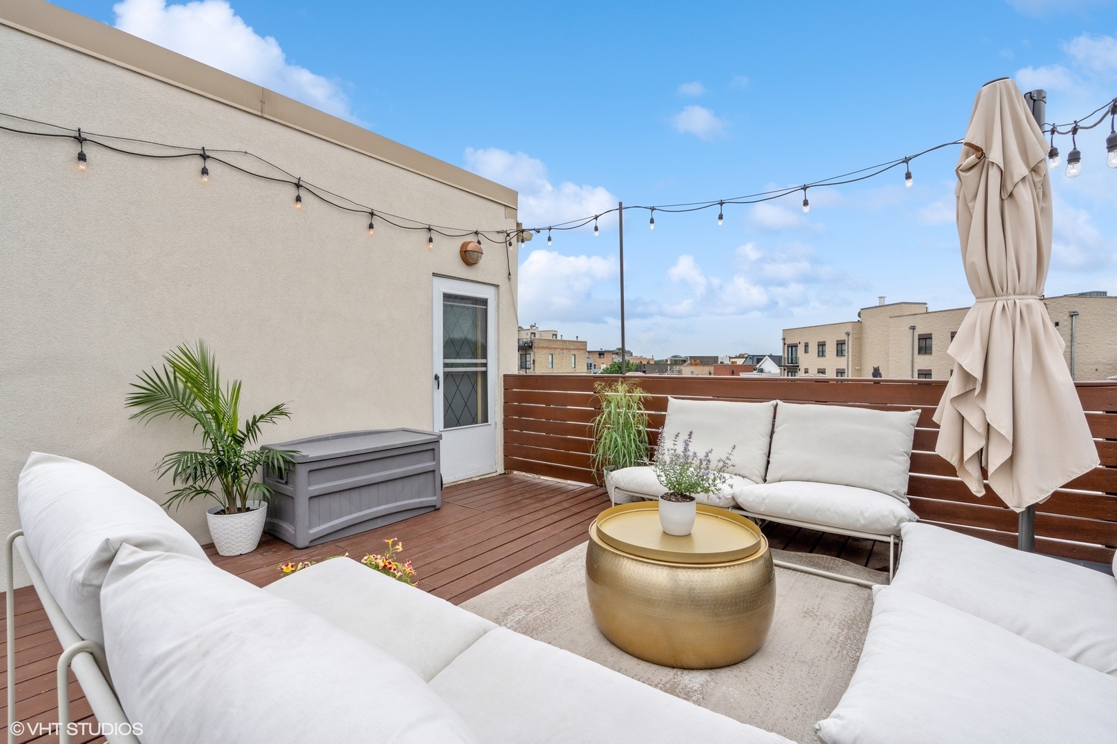 1235 West George Street, Unit 215 Chicago, IL 60657 - Photo 22 of 25 a living room with furniture and a potted plant
