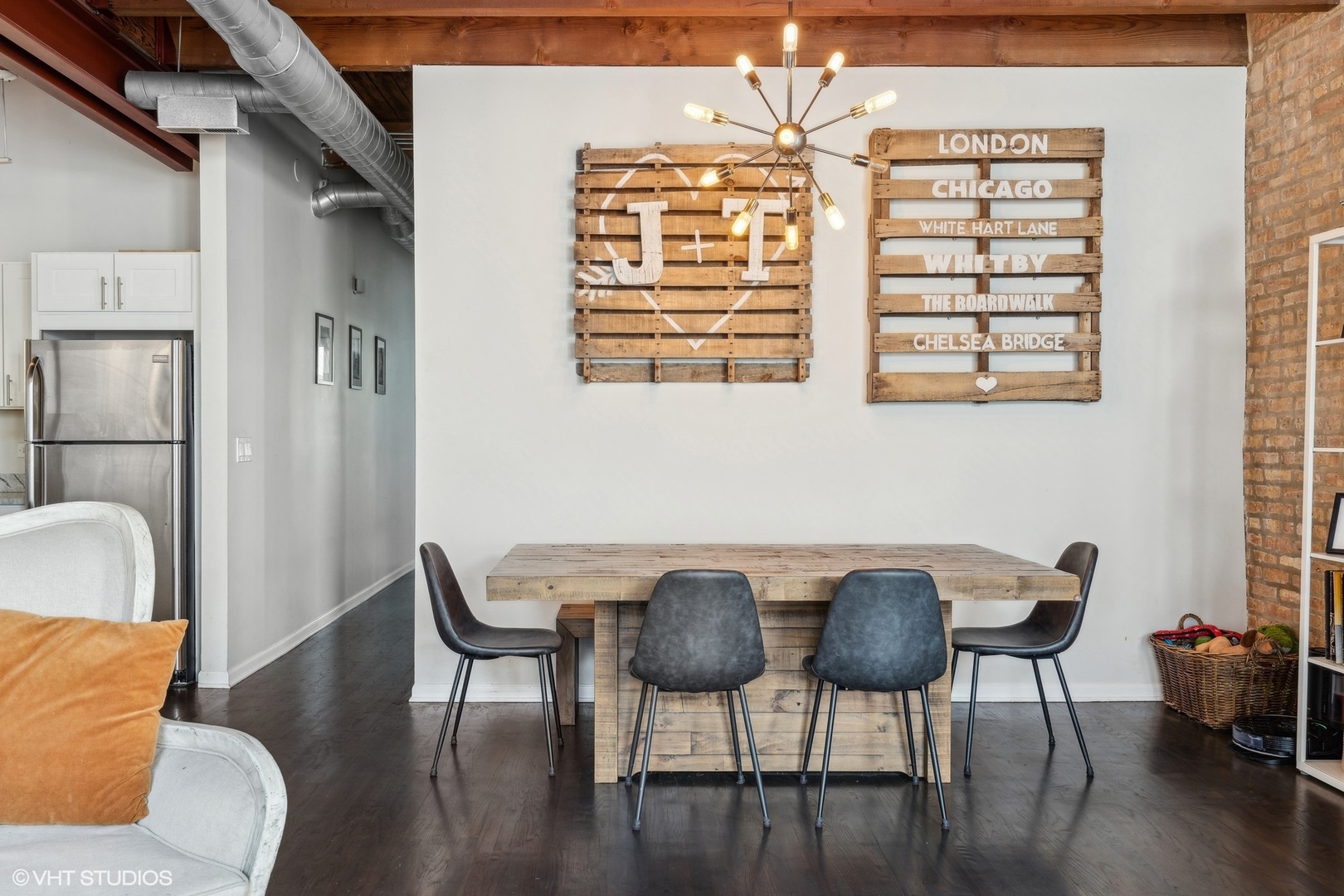 1235 West George Street, Unit 215 Chicago, IL 60657 - Photo 9 of 25 a view of a dining room with furniture and wooden floor