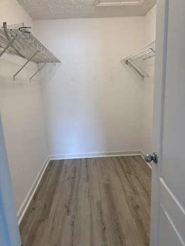 a view of a room with racks on the wall