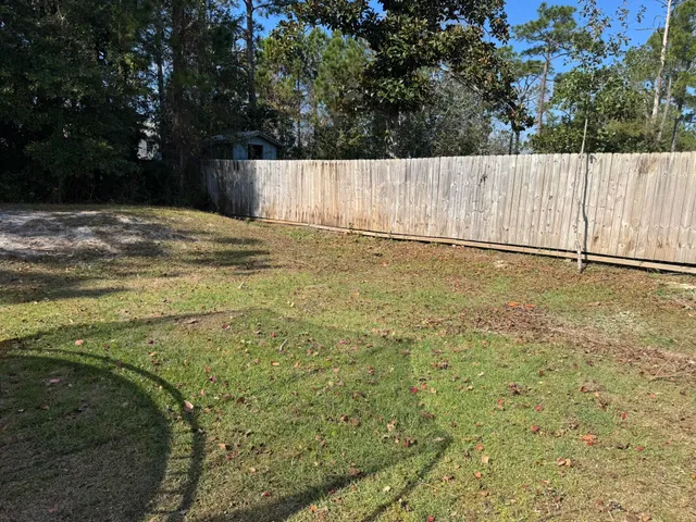 a view of outdoor space and yard