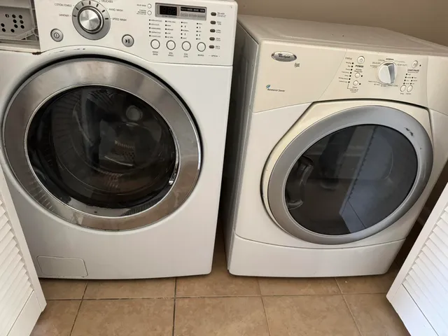 a utility room with dryer and washer