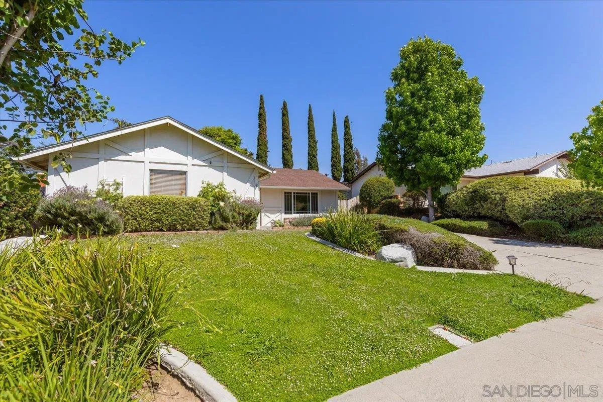 12243 Buckskin Trail Poway, CA 92064 - Photo 41 of 41 a front view of a house with garden