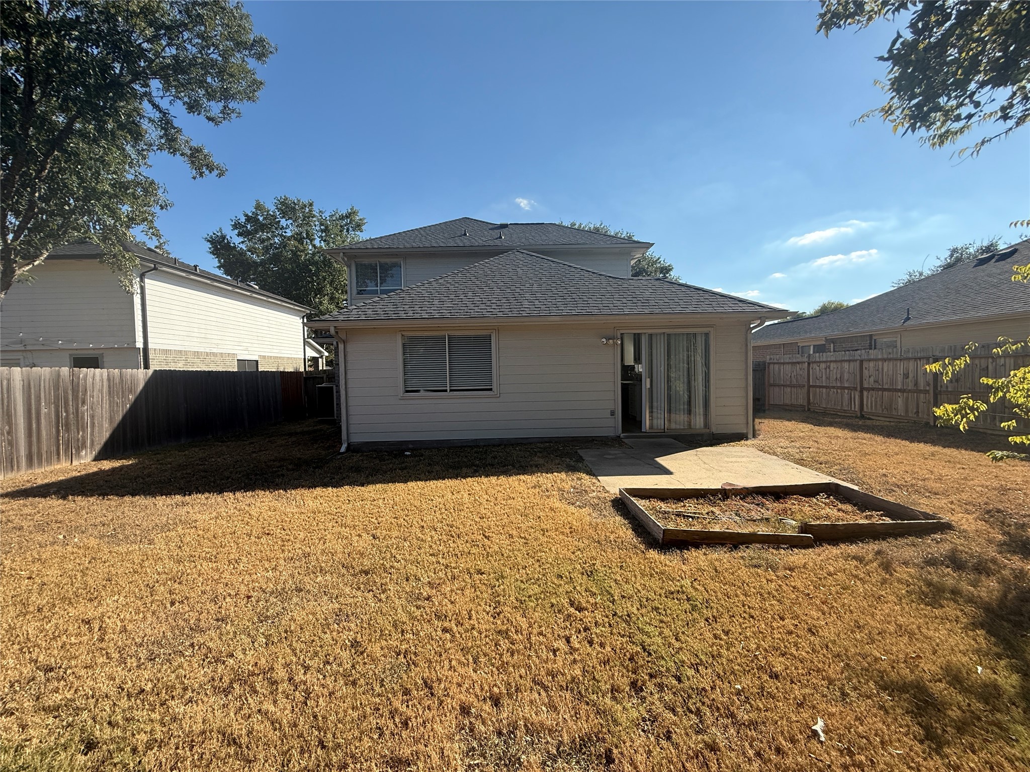 19614 Azalea Valley Drive Katy, TX 77449 - Photo 26 of 27 a front view of a house with a yard
