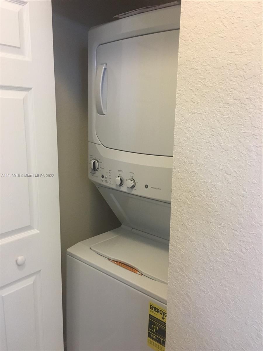 16952 Southwest 90th Street Miami, FL 33196 - Photo 33 of 36 a utility room with dryer and washer