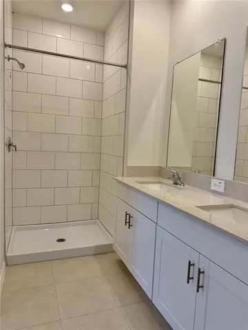 a bathroom with a bathtub and a sink
