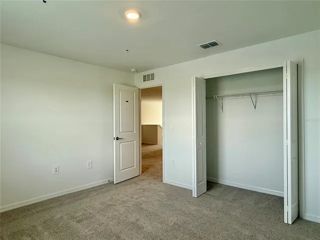 an empty room with closet