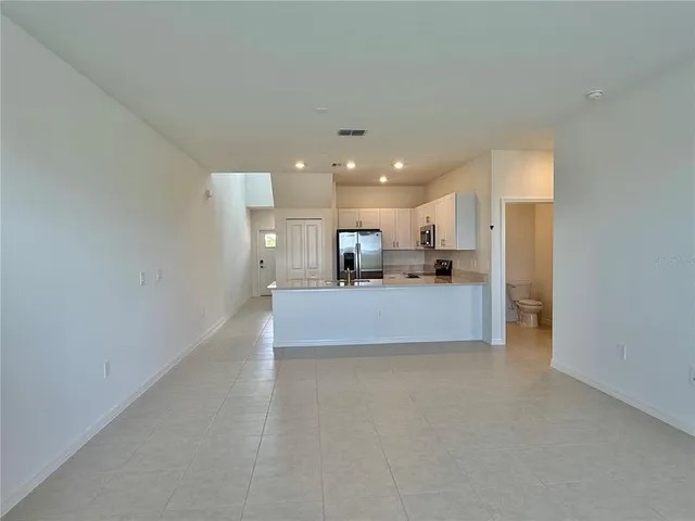 a view of kitchen and a window