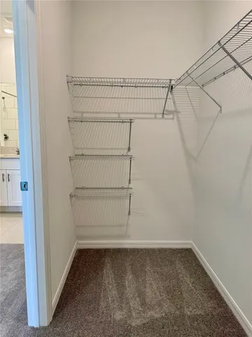 a view of a room with racks on the wall