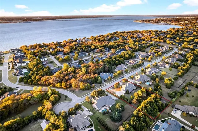 an aerial view of residential building and ocean