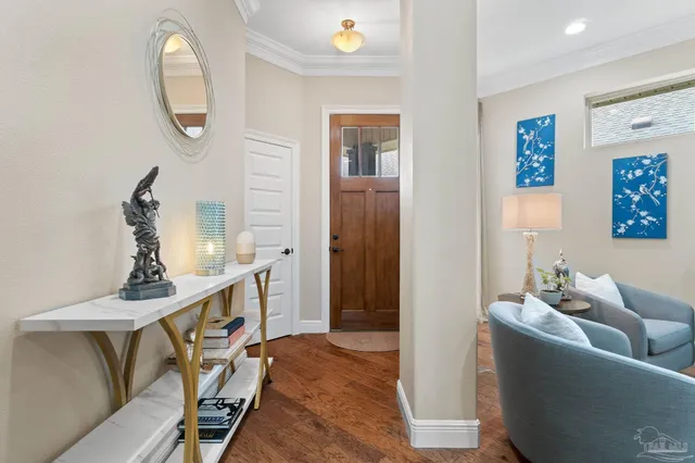 a living room with furniture fireplace and window