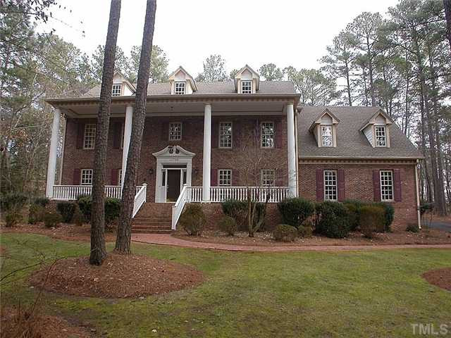 10769 Trego Trail Raleigh, NC 27614 - Photo 1 of 25 Stately 2-story Colonial with grand front porch and columns located on a beautifully landscaped private 1.99 acre wooded lot in Trego Trail. Exterior Front