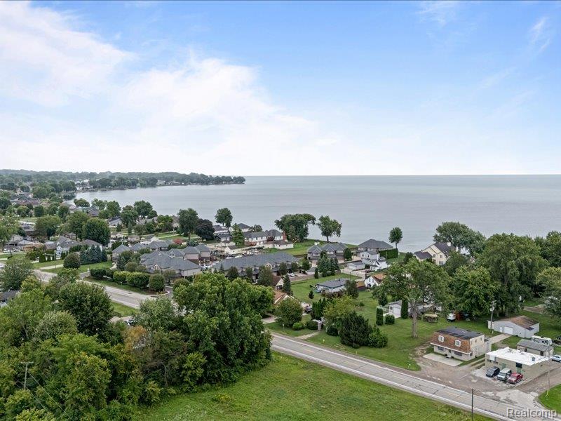 29213 Rachid Lane New Baltimore, MI 48047 - Photo 26 of 26 Aerial view of residential area with a nearby body of water