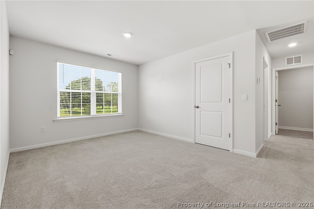 2208 Clydesmill Road Fayetteville, NC 28314 - Photo 4 of 26 an empty room with windows