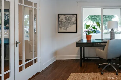 a workspace with furniture and a window