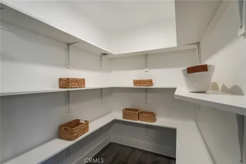 a kitchen with a refrigerator and a sink