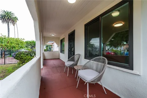 a view of a two chair in the balcony