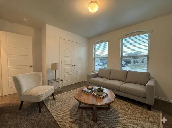 a bathroom with a granite countertop sink a toilet and bathtub