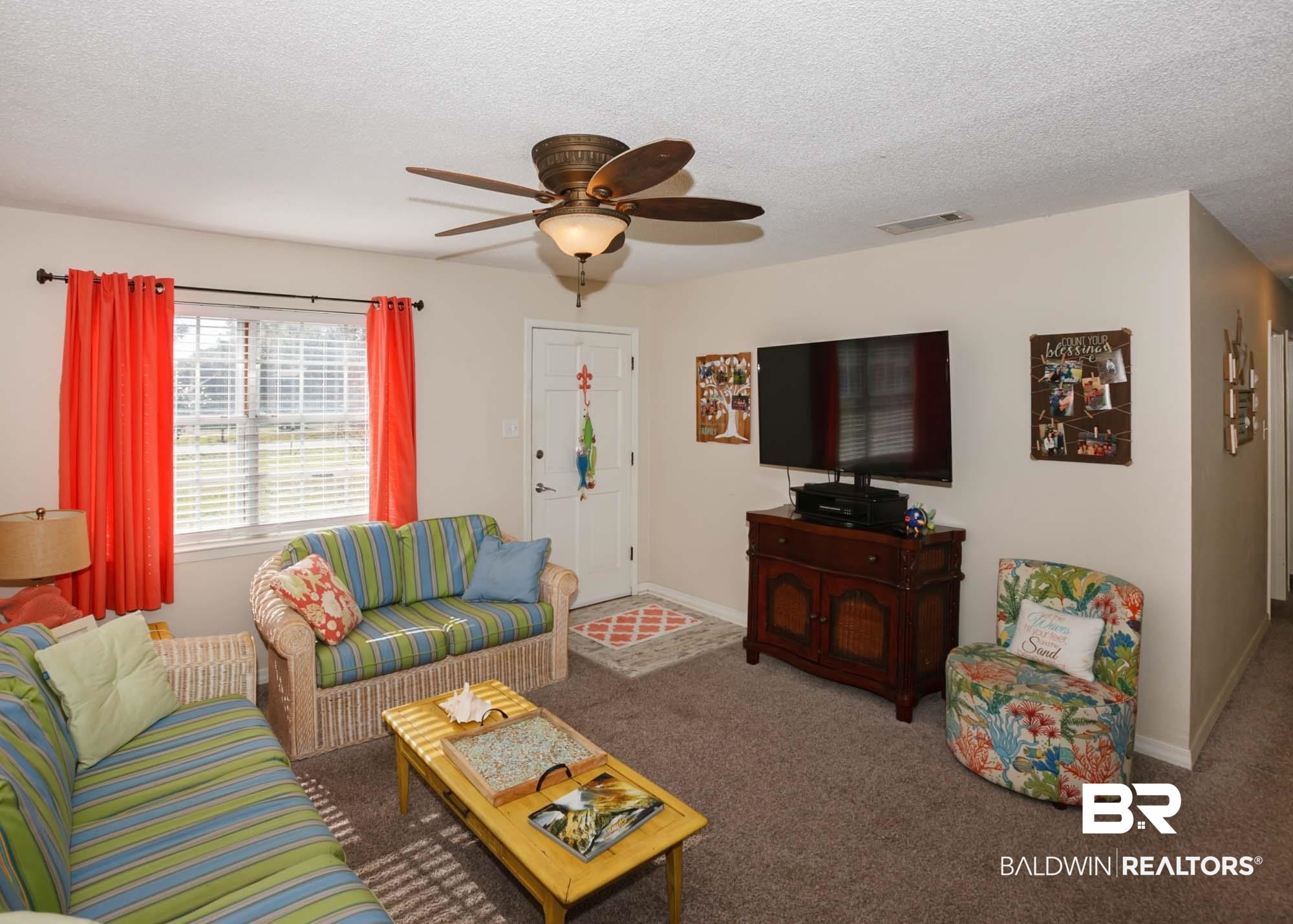 18753 County Road 12 Foley, AL 36535 - Photo 15 of 39 Living room featuring a textured ceiling, carpet floors, and ceiling fan