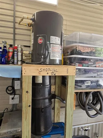 a white toilet sitting next to a bathroom sink